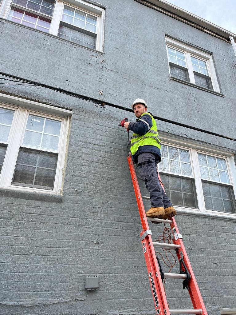 Father & Son team working on a commercial building